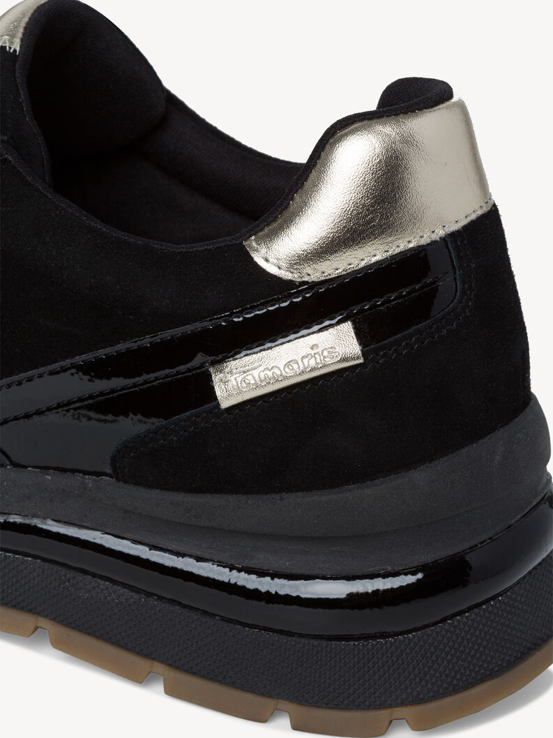 Detailansicht der Ferse schwarzer Tamaris Sneaker mit Metallic-Elementen