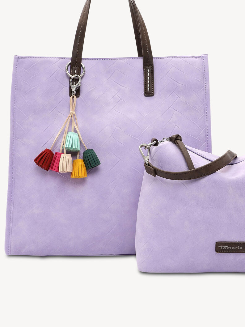 Nahaufnahme fliederfarbene Tasche mit bunten Quasten und braunen Kunstledergriffen