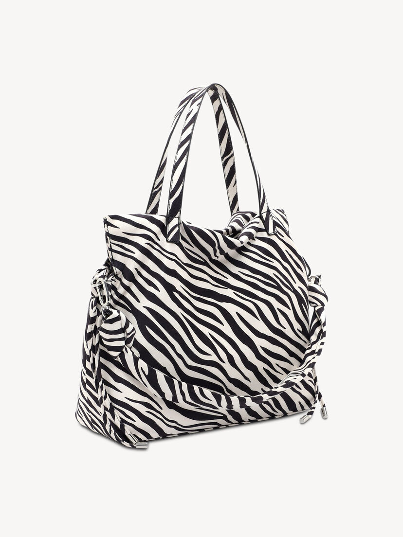 Zijaanzicht van stoffen tas met zwart-wit zebra patroon