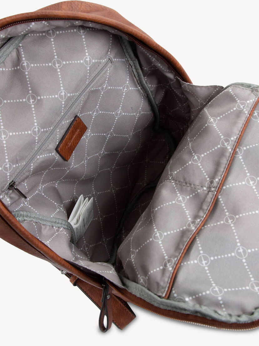 Close-up van grijze binnenvoering met ritsvak in rugzak