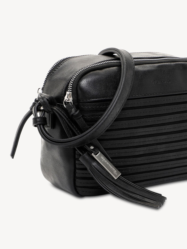 Nahaufnahme schwarzer Lederriemen und dekorative Quaste am Tasche