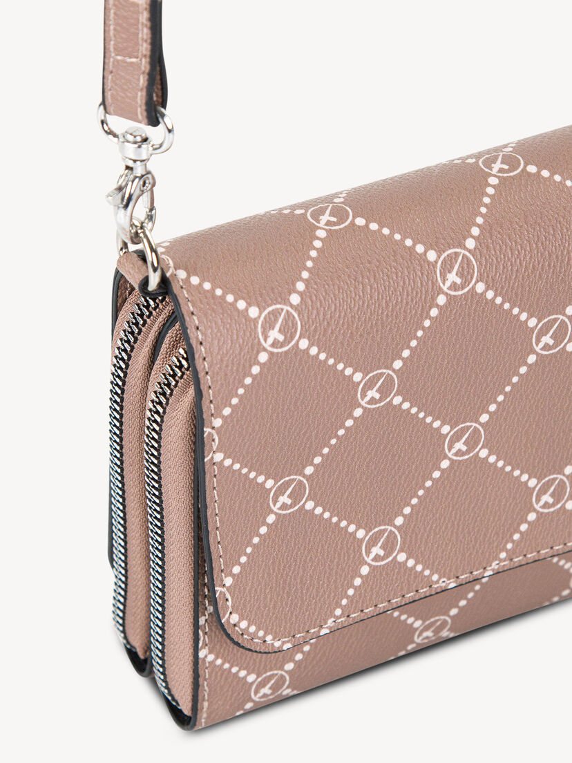 Close-up van roze leren tas met wit patroon en metalen sluiting