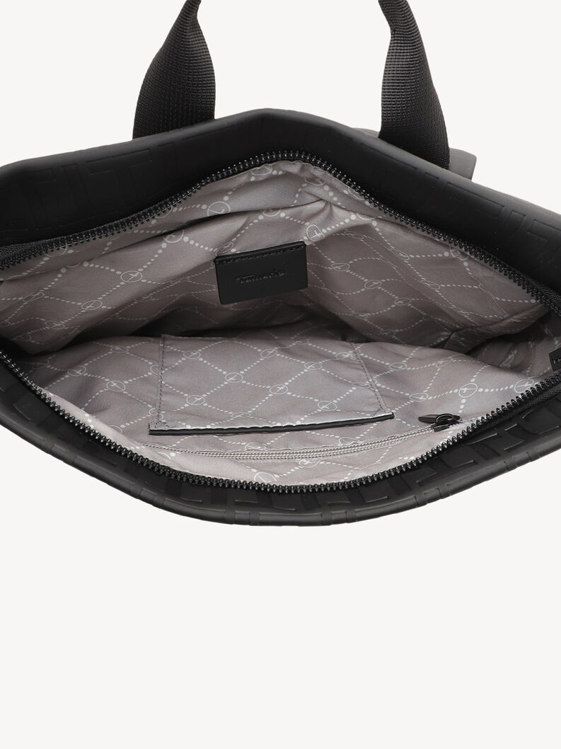Close-up inside black backpack with patterned lining and pocket