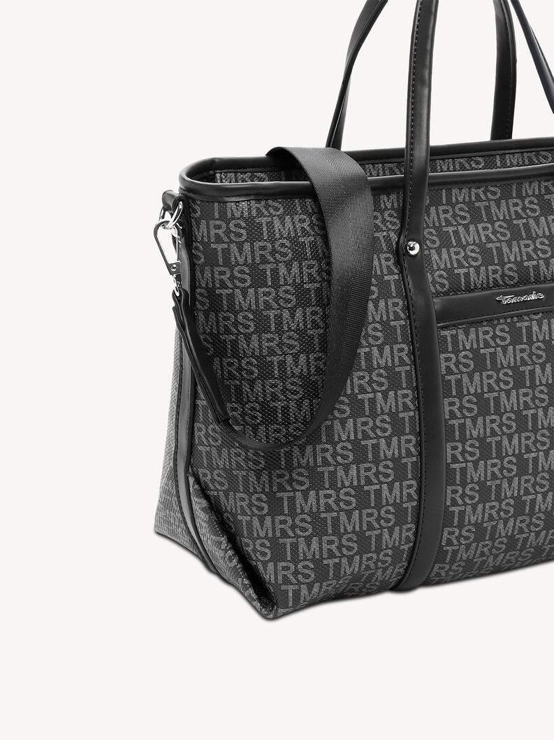 Detail of black TMRS bag with print and adjustable shoulder strap