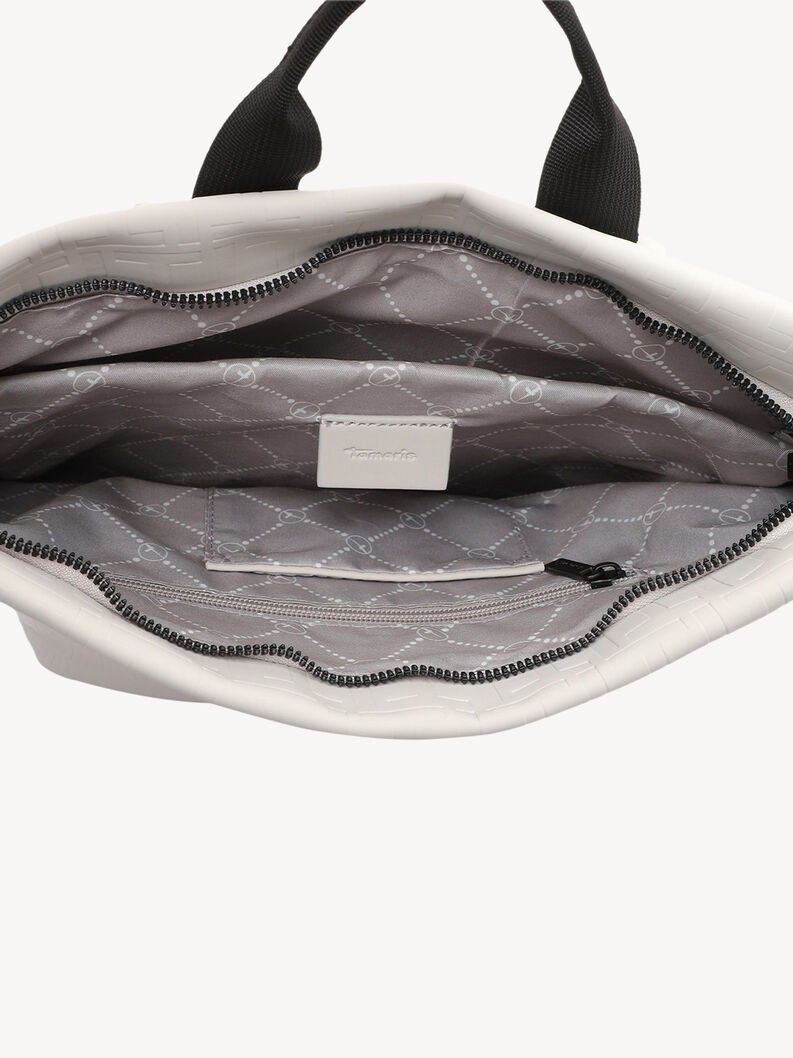 Szczeg&oacute;ł szarego wnętrza białego plecaka z wewnętrzną kieszenią i zamkiem