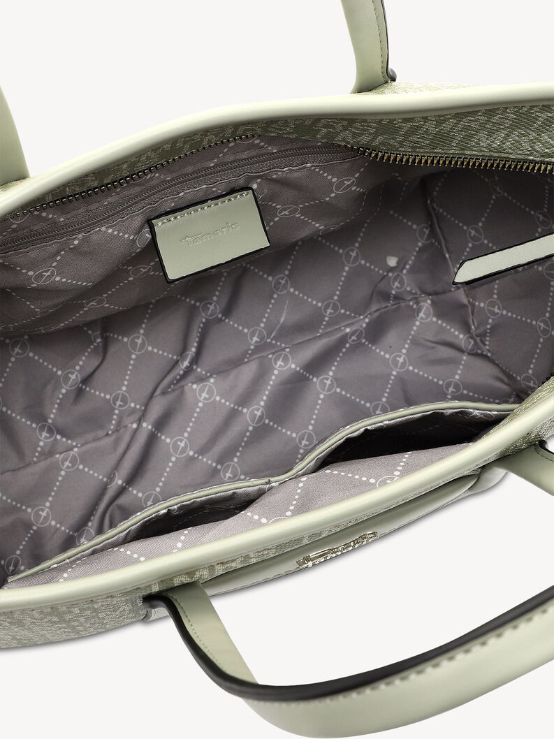 Inside view of green bag with lining and zippered pockets