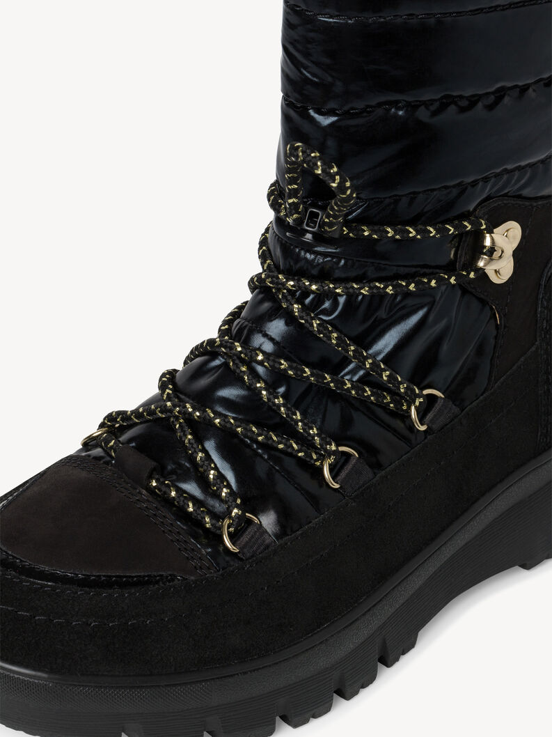 Detailansicht schwarzer Winterschuh mit gl&auml;nzendem Obermaterial und gelb-schwarzen Schn&uuml;rsenkeln