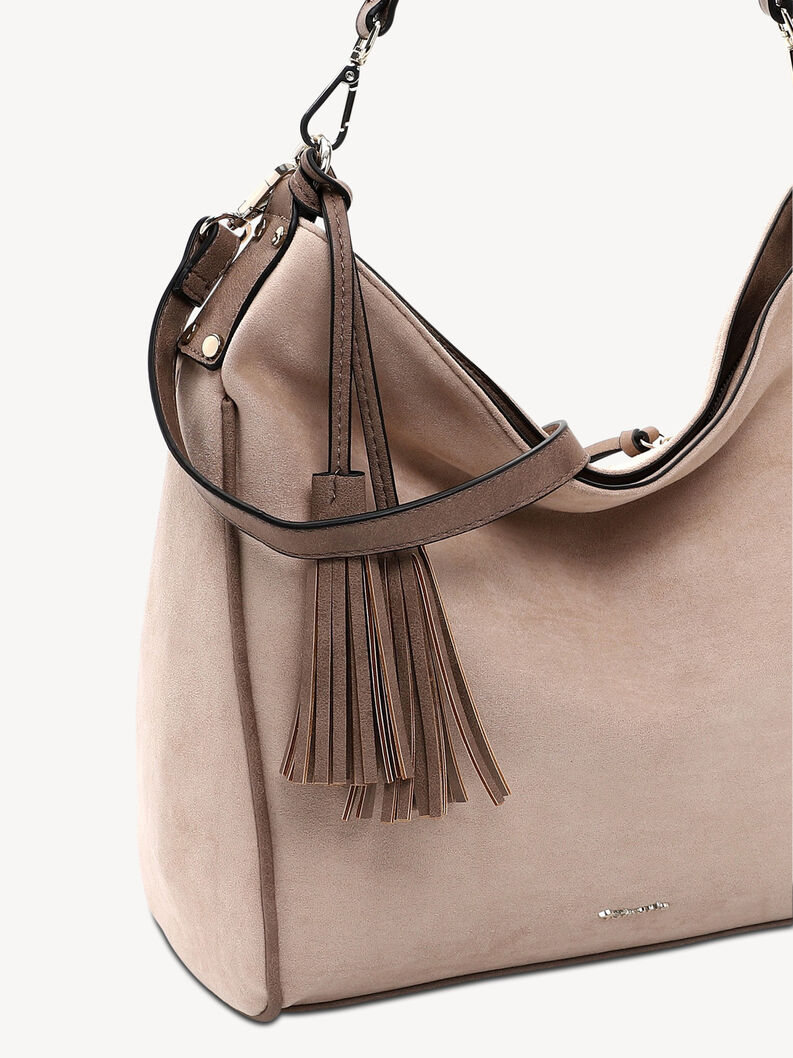 Detalje af lyser&oslash;d ruskindstaske med markante l&aelig;derduske