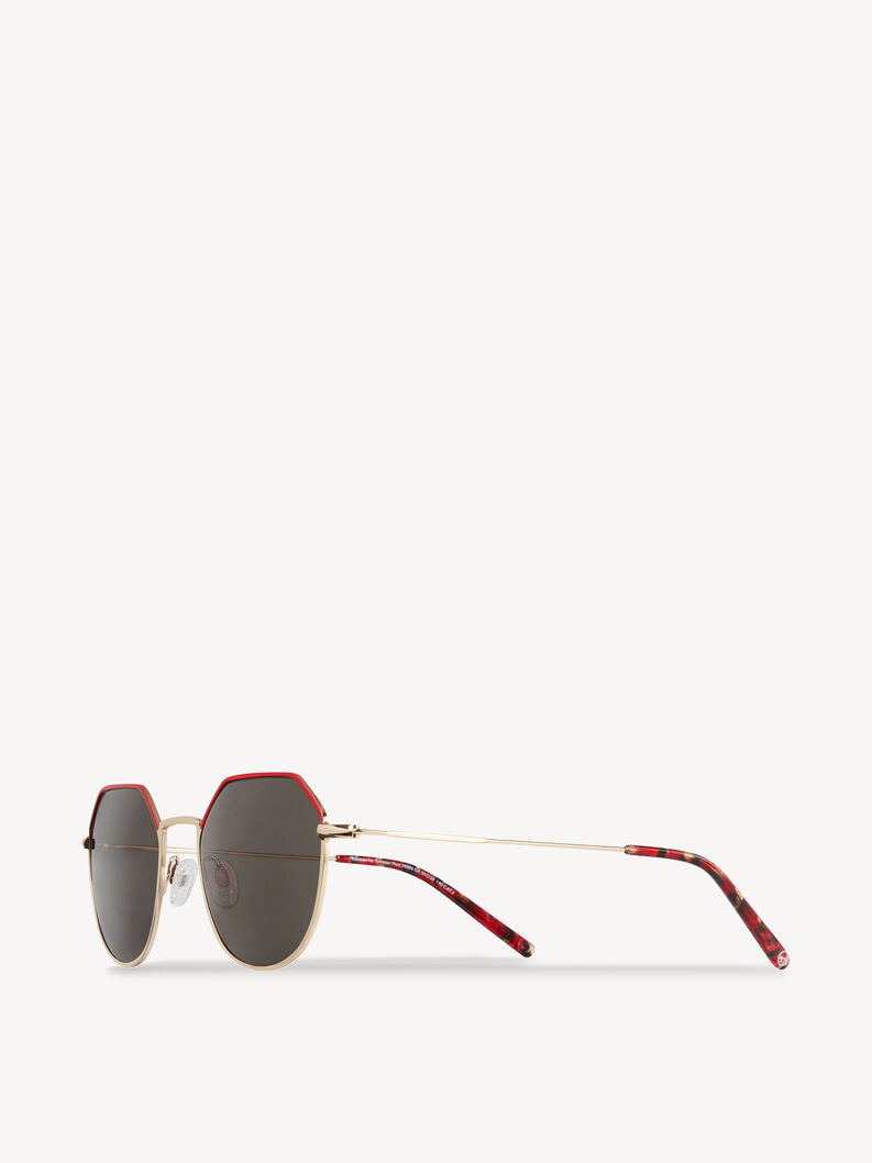 Side view of sunglasses with red accents and gold metal frame