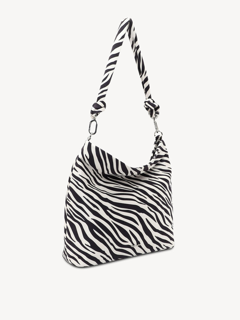 Zijaanzicht van zwart-witte zebra handtas met knoopriem en metalen sluitingen