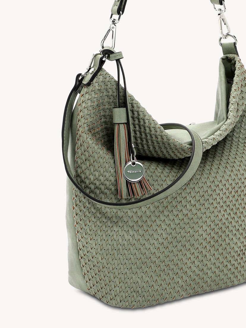 Close-up van groene tas met geweven structuur en merkembleem