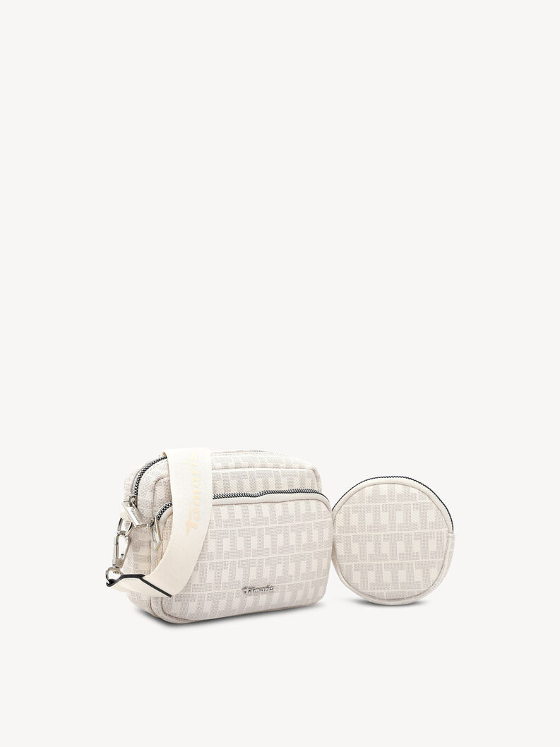 Bočn&iacute; pohled na b&eacute;žovou crossbody ta&scaron;ku s motivem, kulatou kapsou a nastaviteln&yacute;m p&aacute;skem