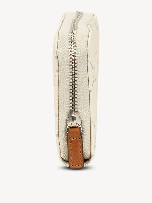 Close-up of cream wallet zipper with brown leather pull tab
