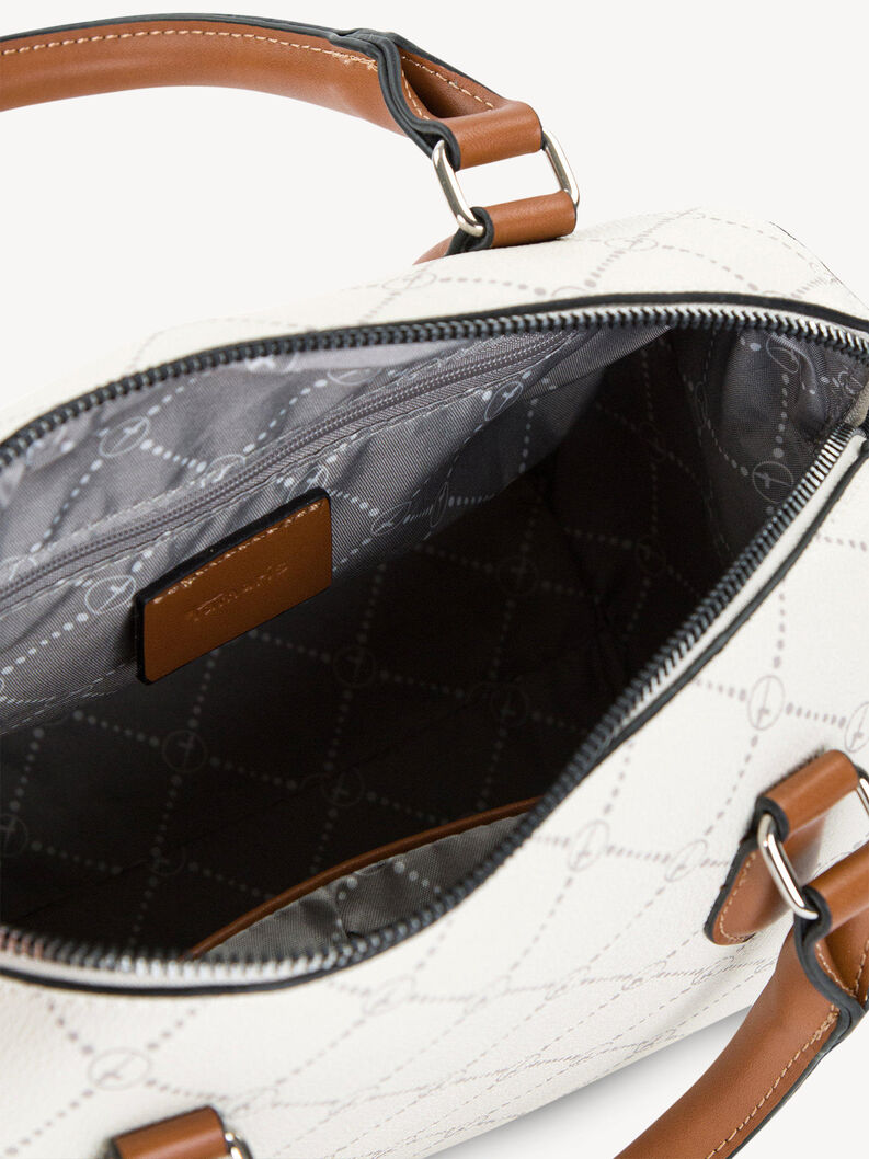 Zbliżenie wnętrza białej torebki z brązowymi akcentami