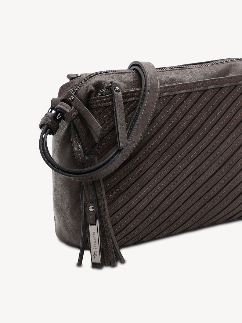 Nahaufnahme des braunen Lederbands und der Quaste der Tasche